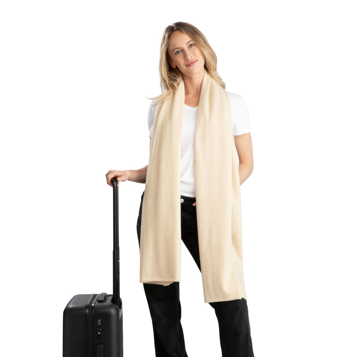 The one you'll reach for everywhere. A soft cashmere wrap that works as a scarf, blanket or extra layer when temperatures drop.